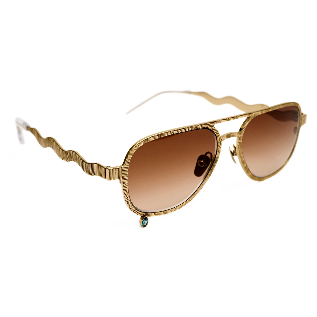 Aviator sunglasses with a textured gold-tone metal frame, wavy temple arms, and brown gradient lenses, shown on a plain white background.