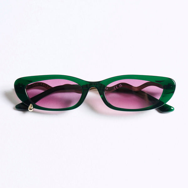 Cat-eye sunglasses with a translucent dark green acetate frame and pink-tinted lenses, photographed on a clean white background.
